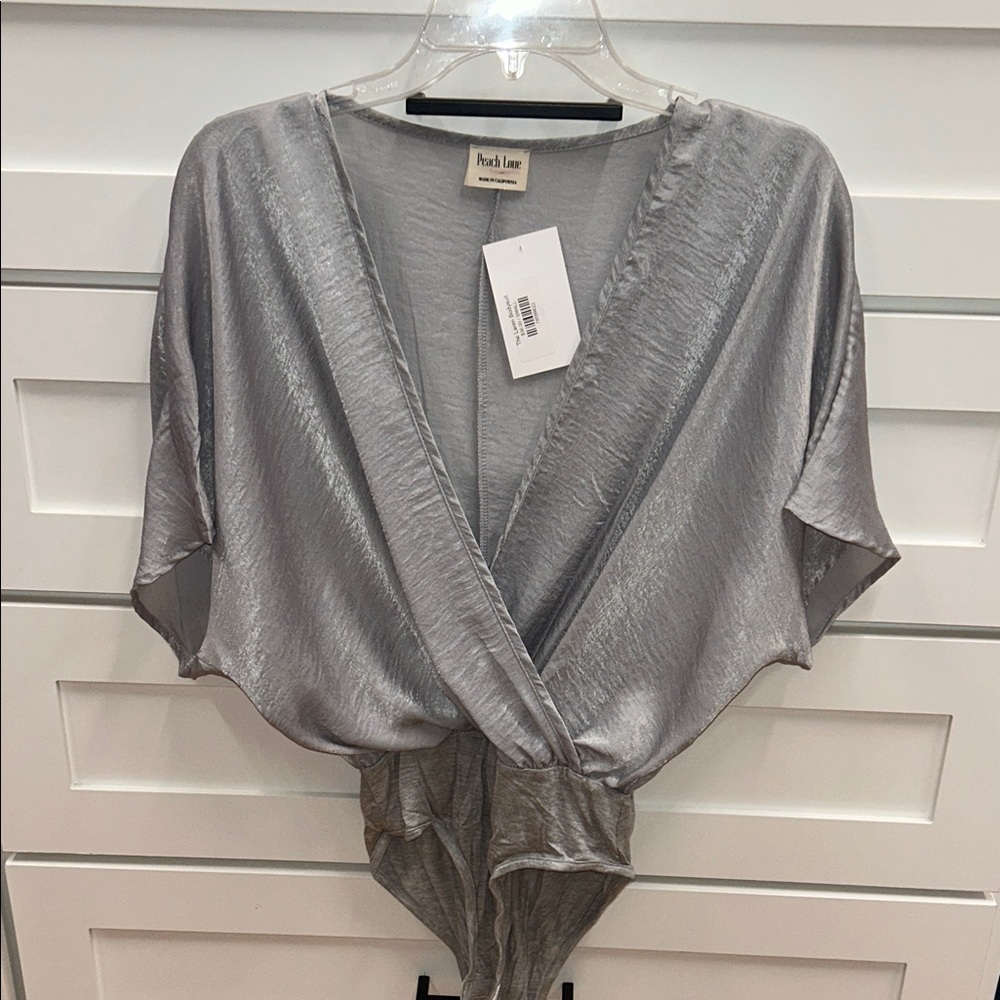 Silver Wrap Bodysuit Size S (NWT)